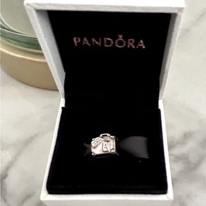 Pandora luggage charm with box.